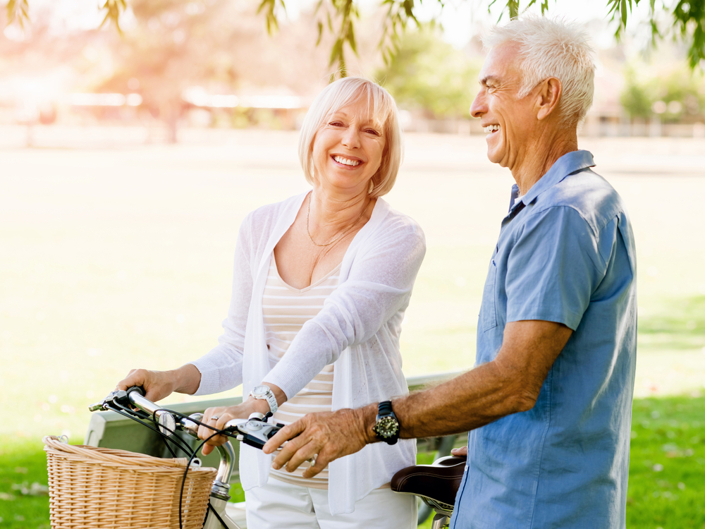 Senior,Couple,Relaxing,In,Park